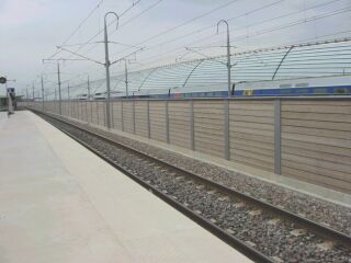 Luc snaps two TGVs crossing at Avignon TGV. A sound barrier partly obscures the TGV on the other line.